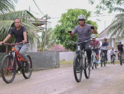 Kapolres Serdang Bedagai AKBP Dr. Ali Machfud, SIK Berolahraga Sepeda (Gowes) Sekaligus Mengecek Situasi Kamtibmas Di Wilayah Hukum Polres Serdang Bedagai