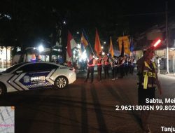 Sat Lantas Polres Tanjungbalai Kawal Pawai Lilin Waisak